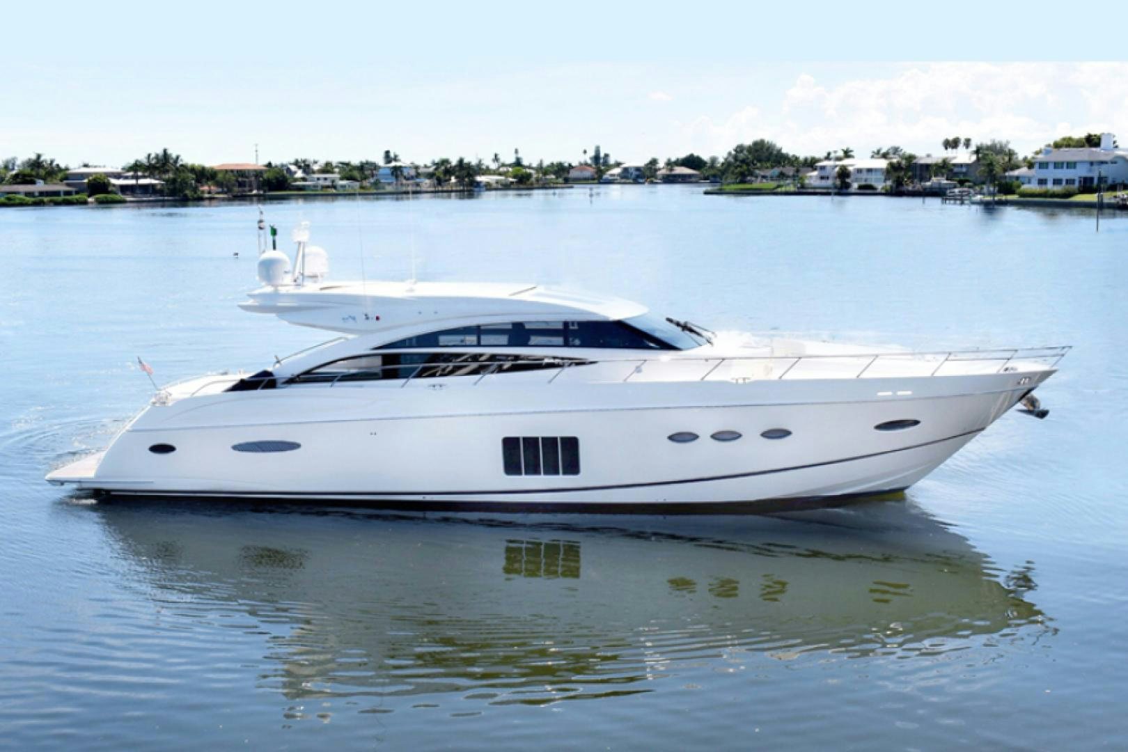 a white yacht on the water aboard No Name Yacht for Sale