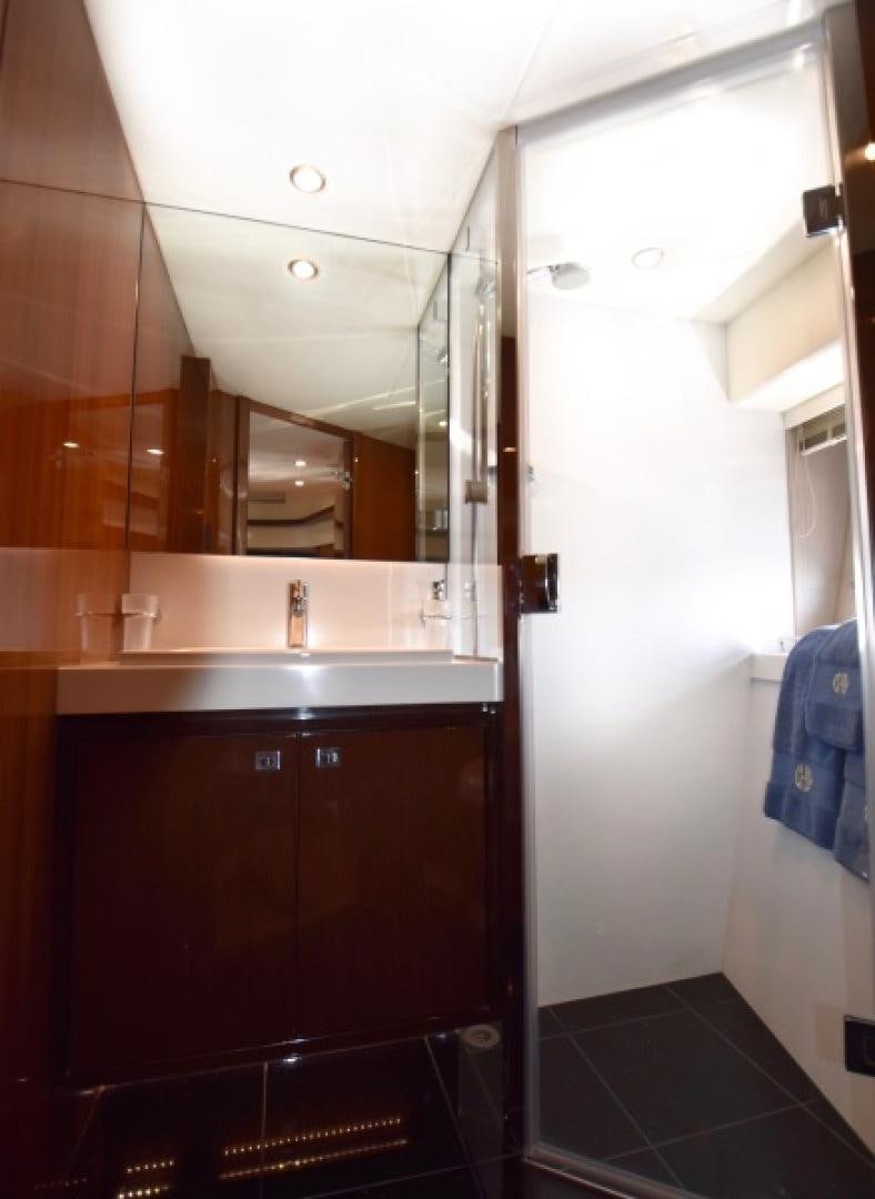 a bathroom with a sink and a mirror aboard No Name Yacht for Sale
