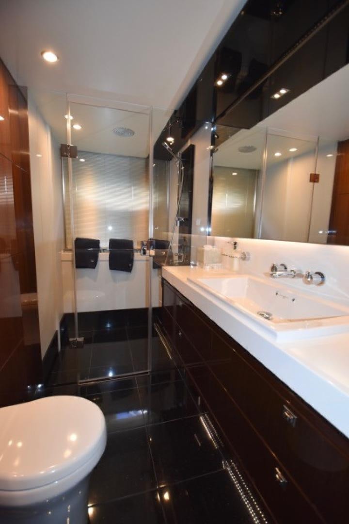 a bathroom with a stand up shower aboard No Name Yacht for Sale