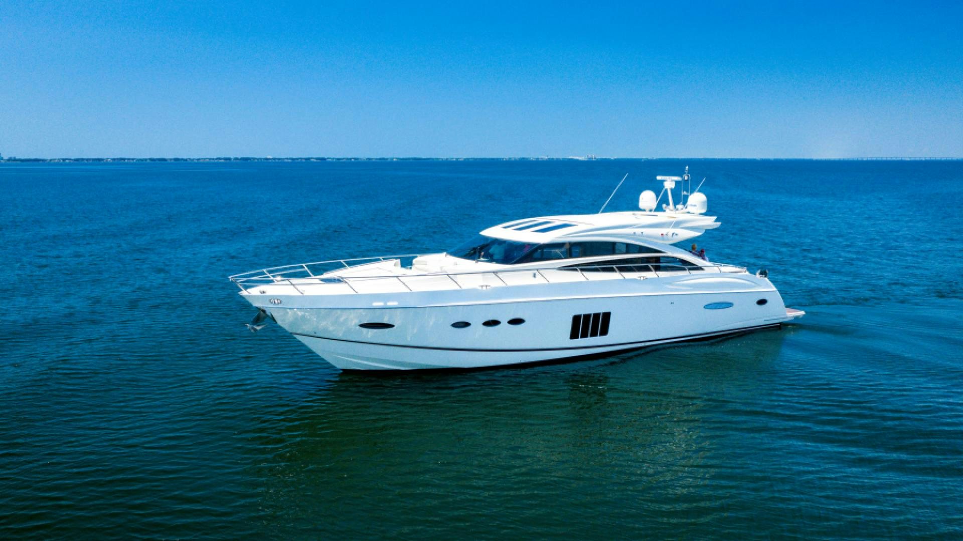 a white yacht in the water aboard No Name Yacht for Sale