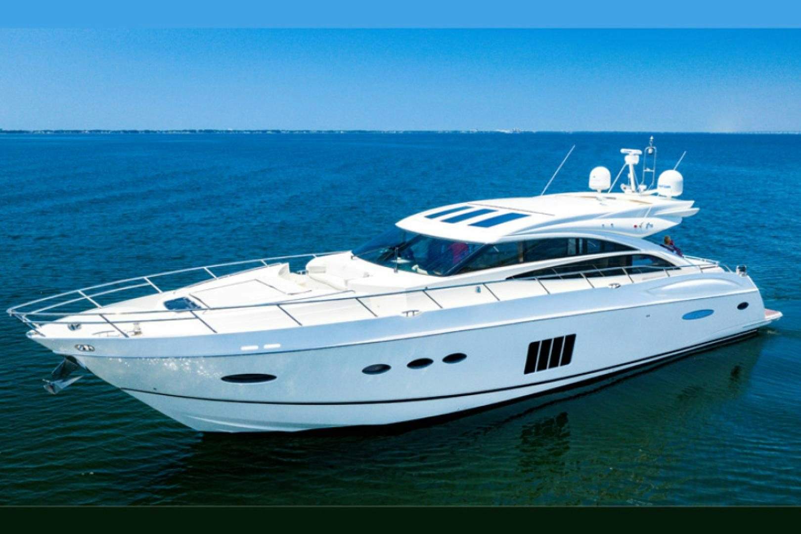 a white yacht in the water aboard No Name Yacht for Sale