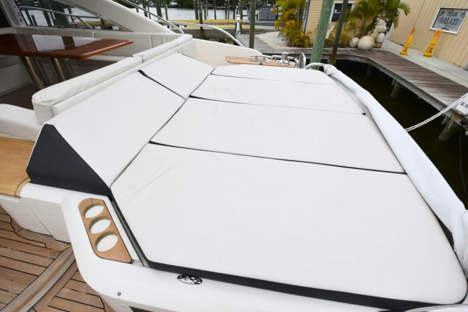 a white rectangular object on a wooden surface aboard No Name Yacht for Sale