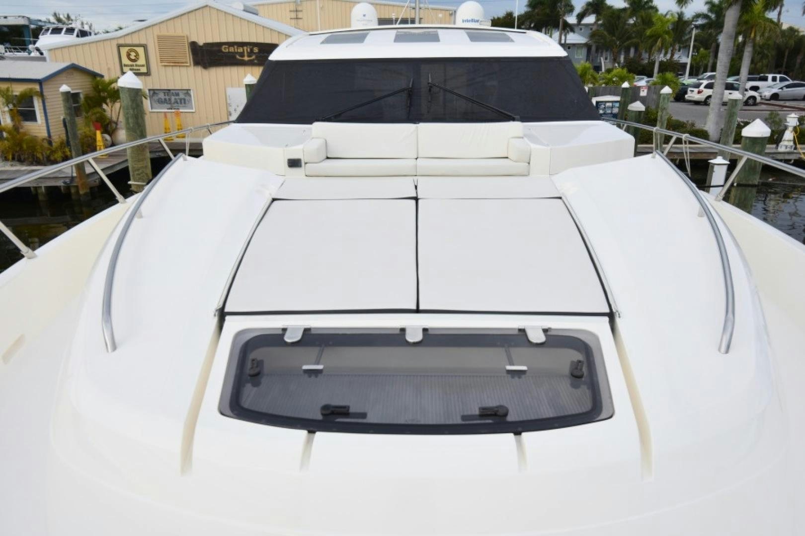 the front of a white car aboard No Name Yacht for Sale