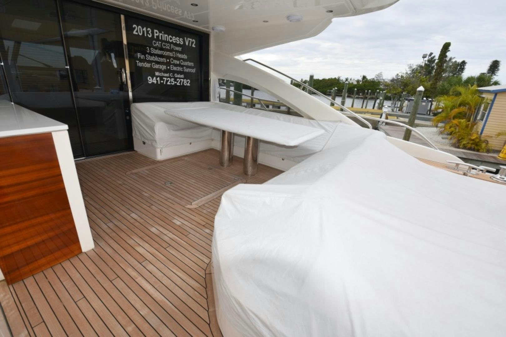 a bed on a deck aboard No Name Yacht for Sale