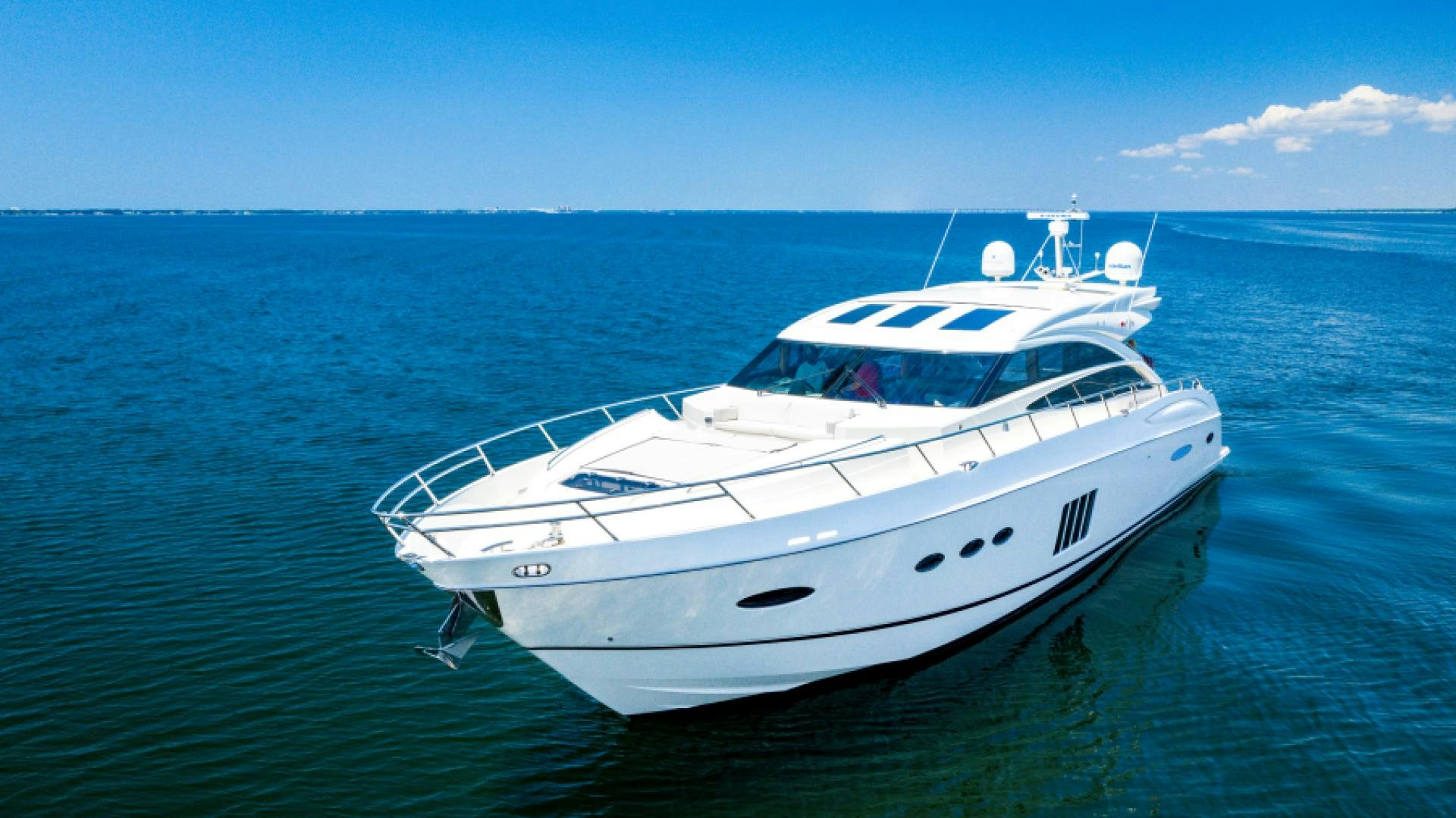 a white yacht in the water aboard No Name Yacht for Sale