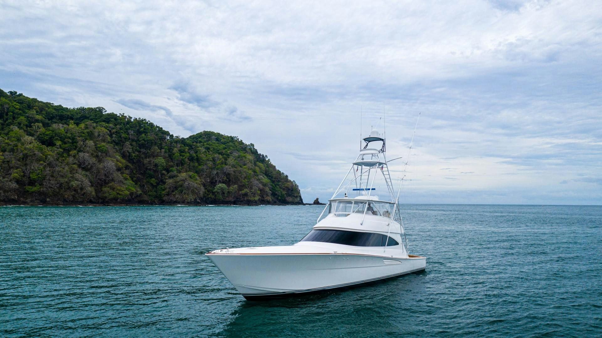 a white boat in the water aboard GOOSE Yacht for Sale