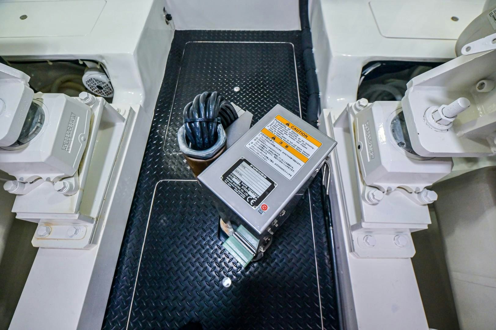 a car with a box and a box inside aboard GOOSE Yacht for Sale