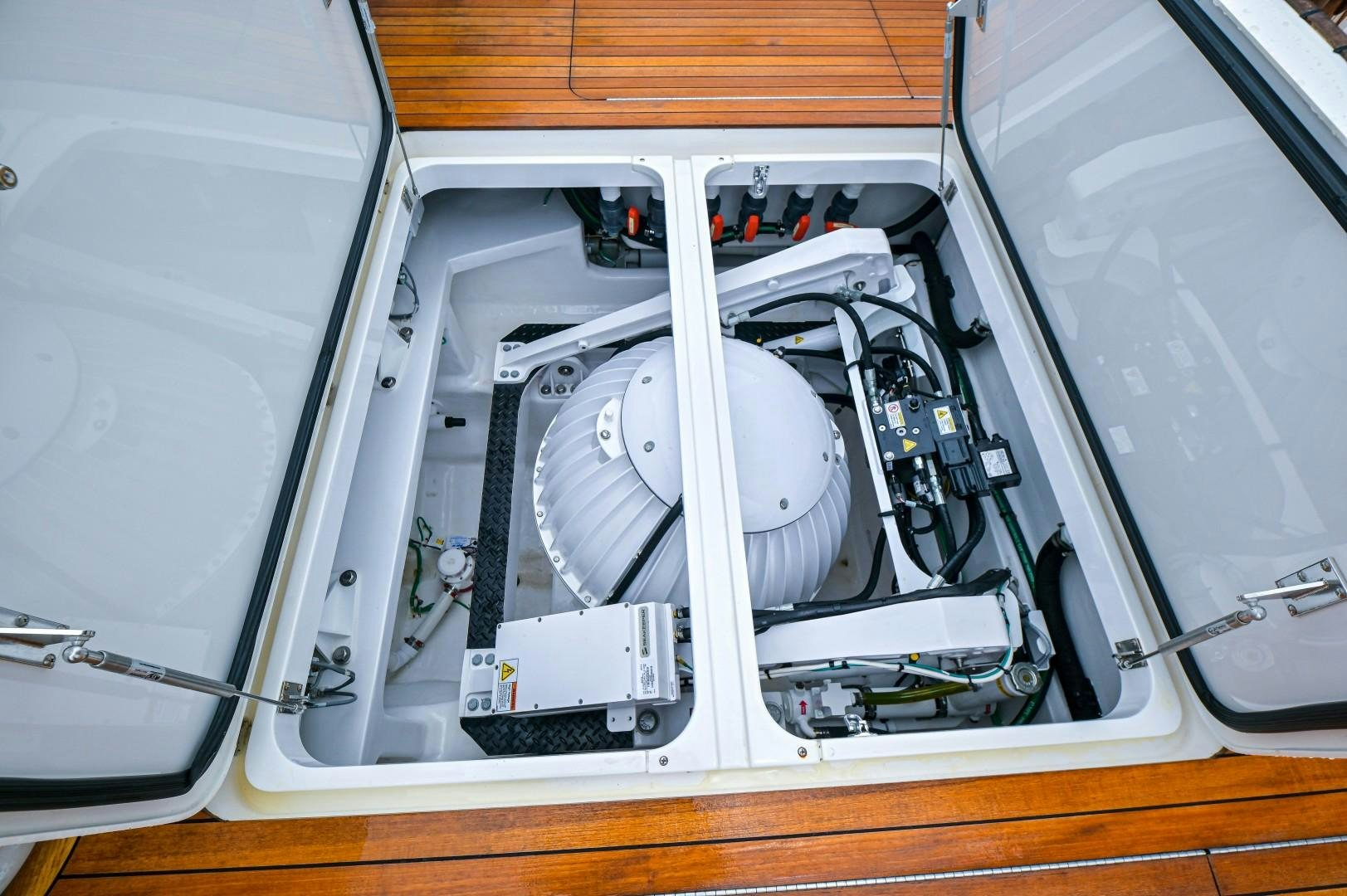 a close-up of a car engine aboard GOOSE Yacht for Sale