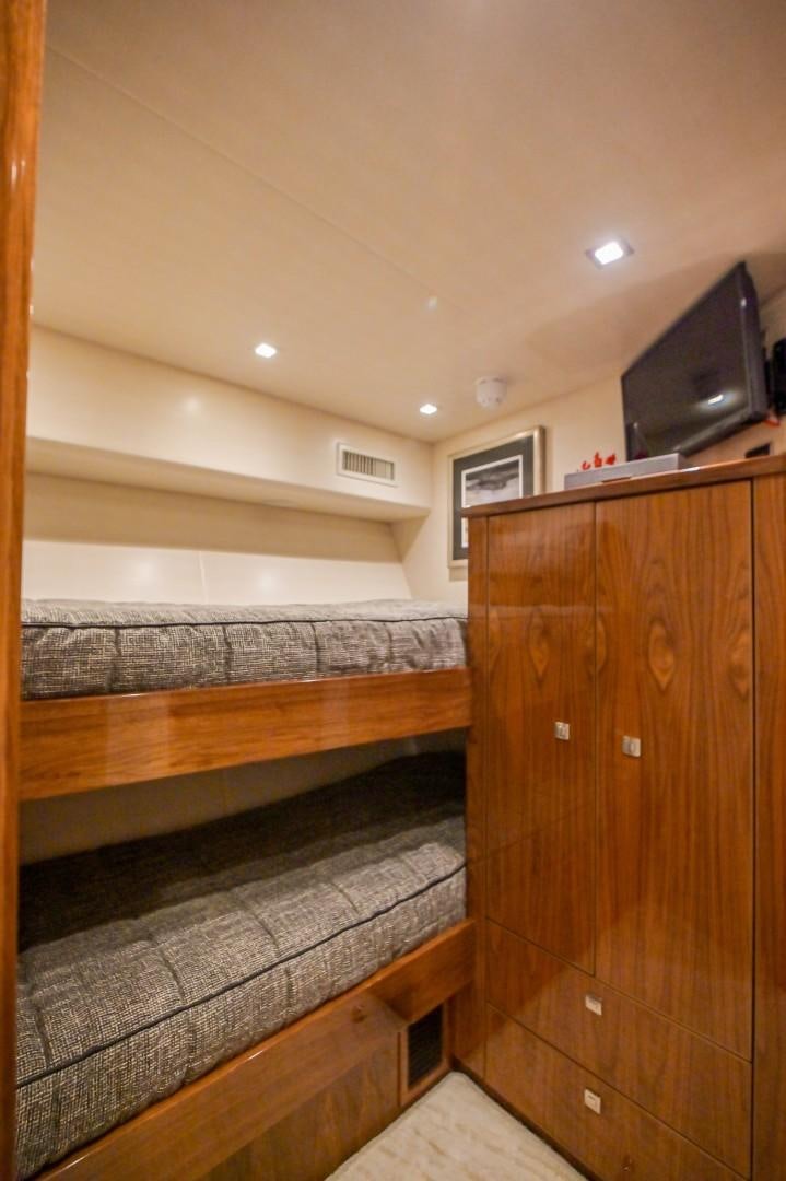 a wood cabinet in a room aboard GOOSE Yacht for Sale