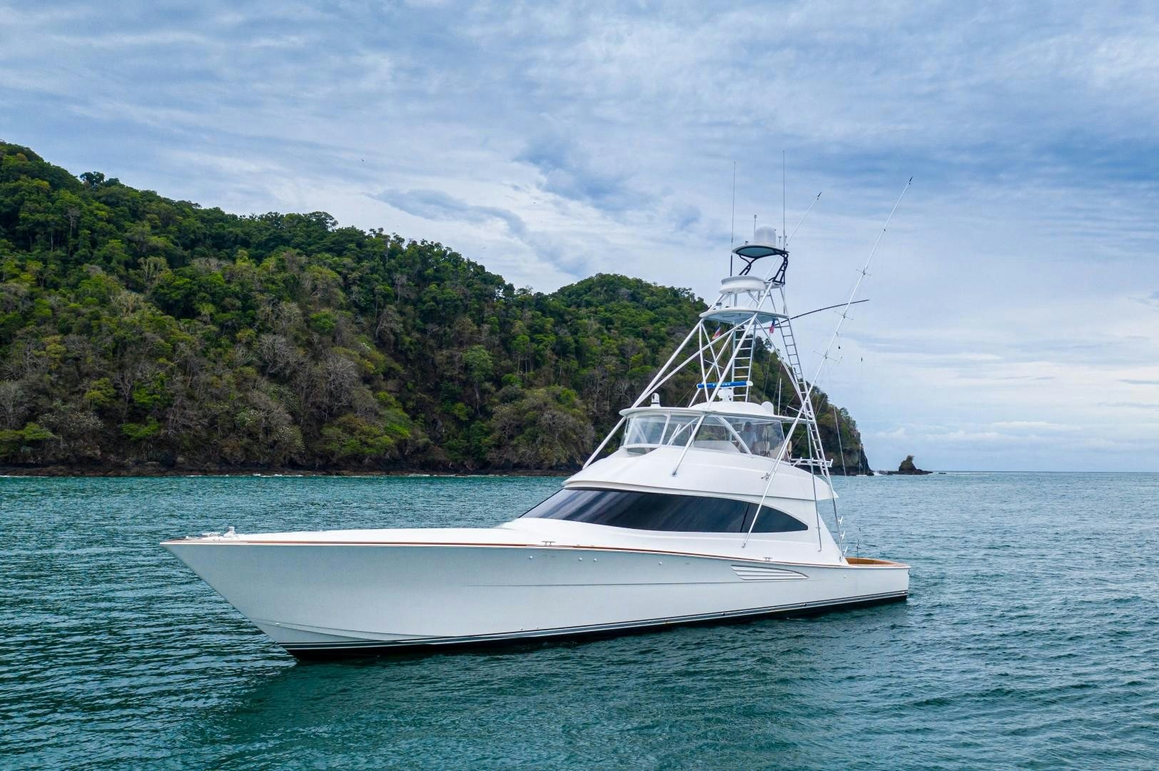 a white boat in the water aboard GOOSE Yacht for Sale