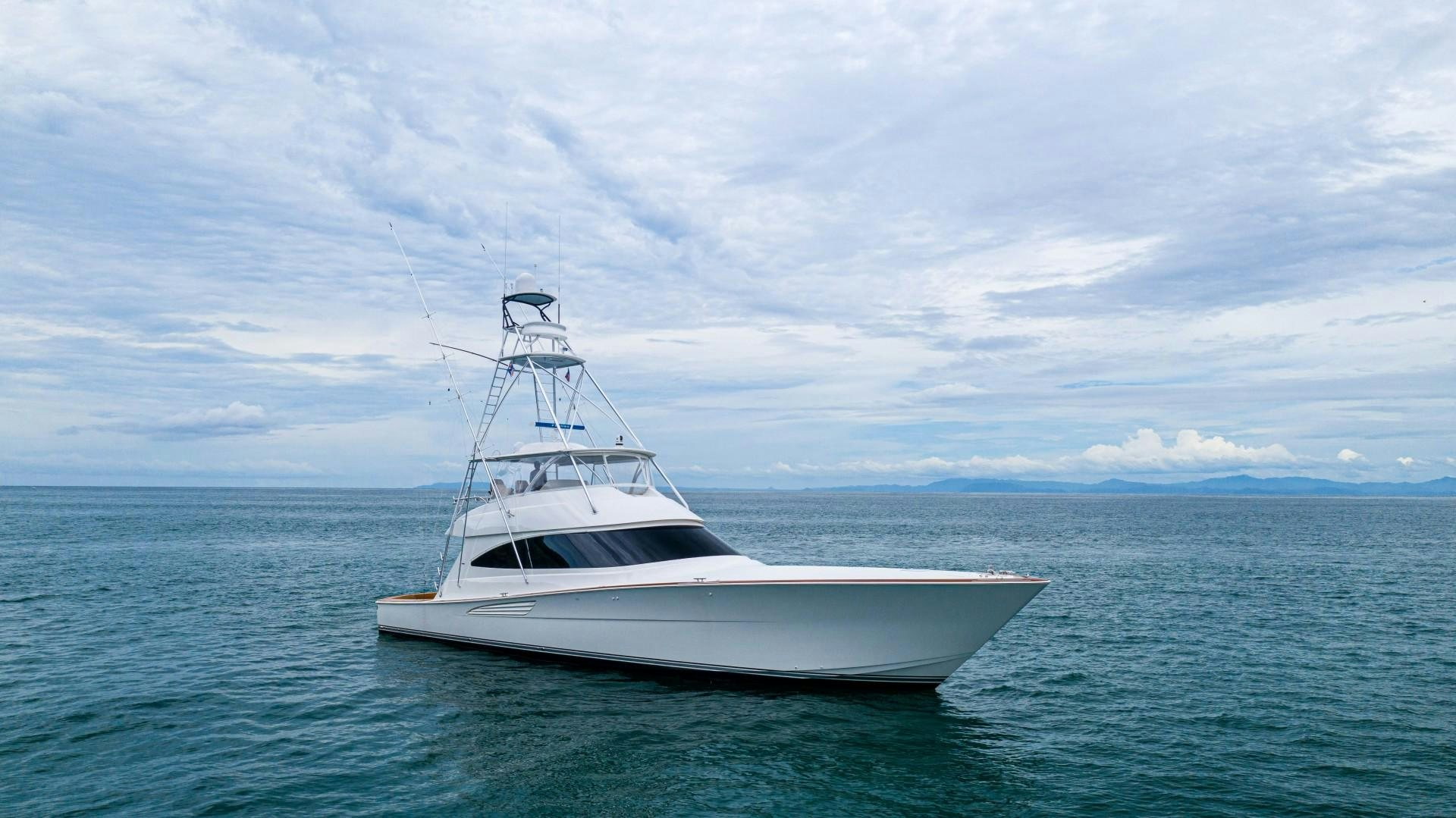 a white boat in the water aboard GOOSE Yacht for Sale