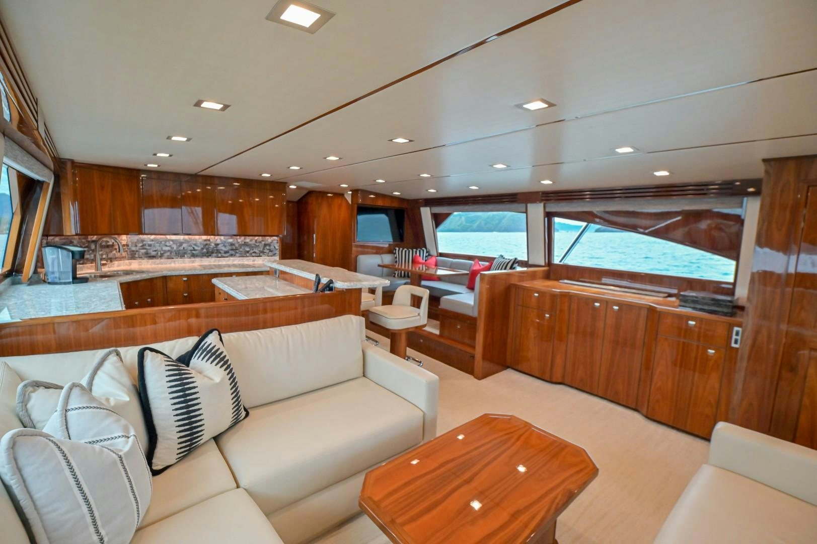 a living room with a large window aboard GOOSE Yacht for Sale