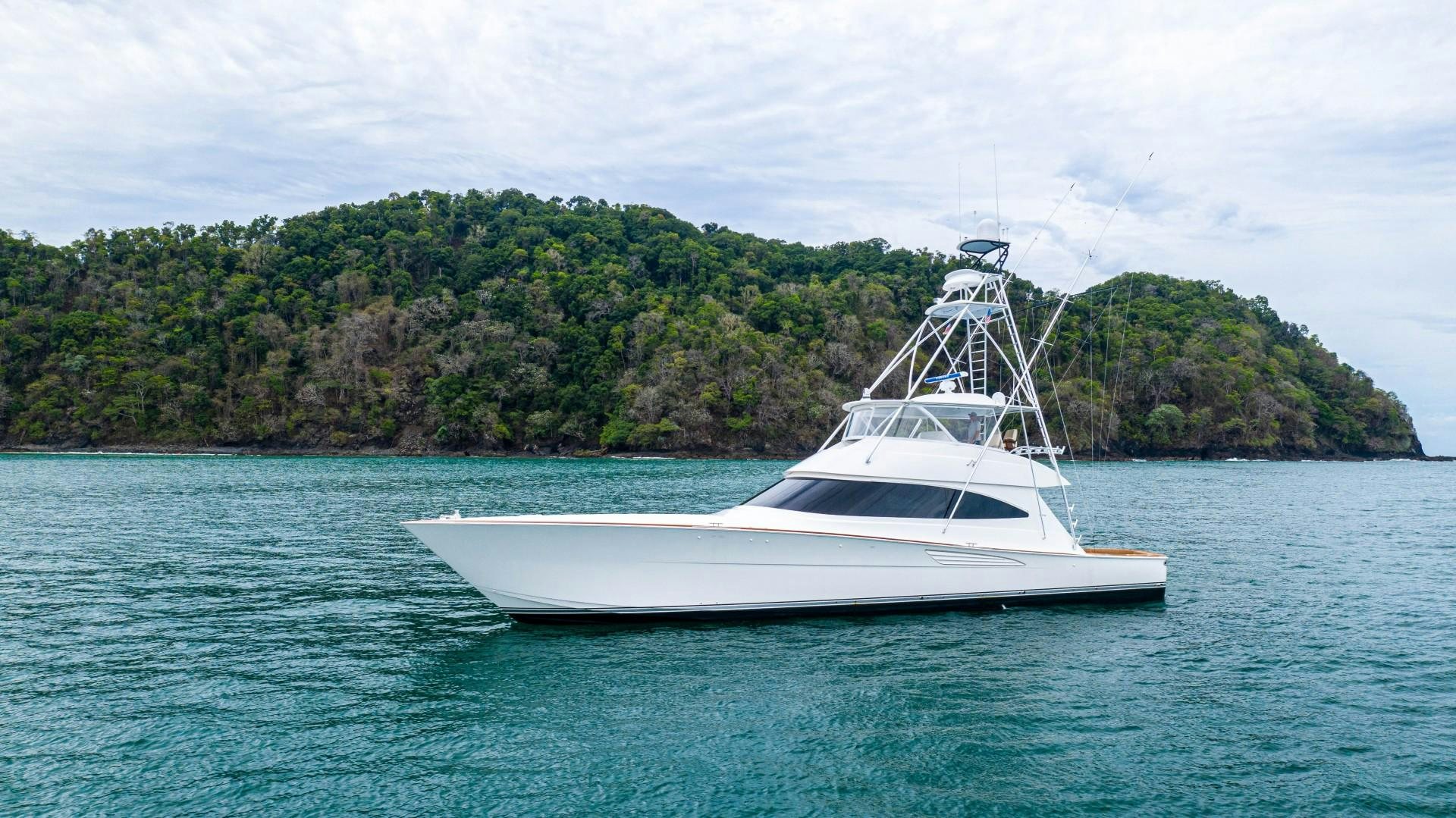 a white boat in the water aboard GOOSE Yacht for Sale