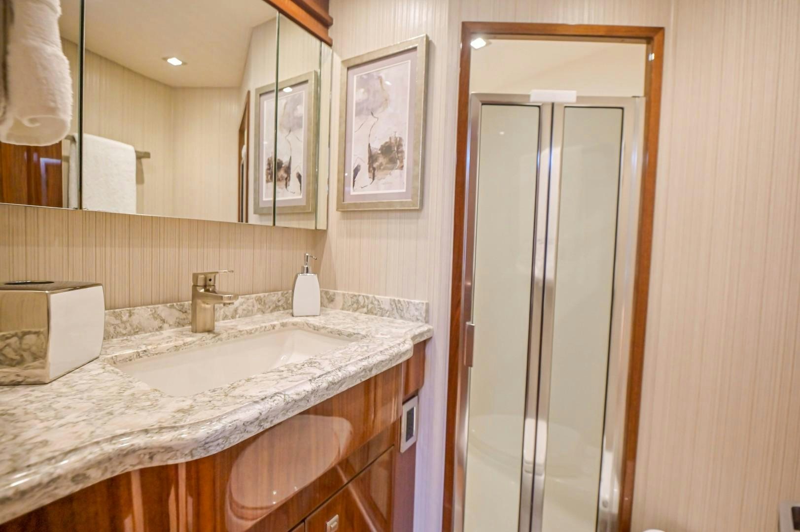 a bathroom with a sink and a mirror aboard GOOSE Yacht for Sale