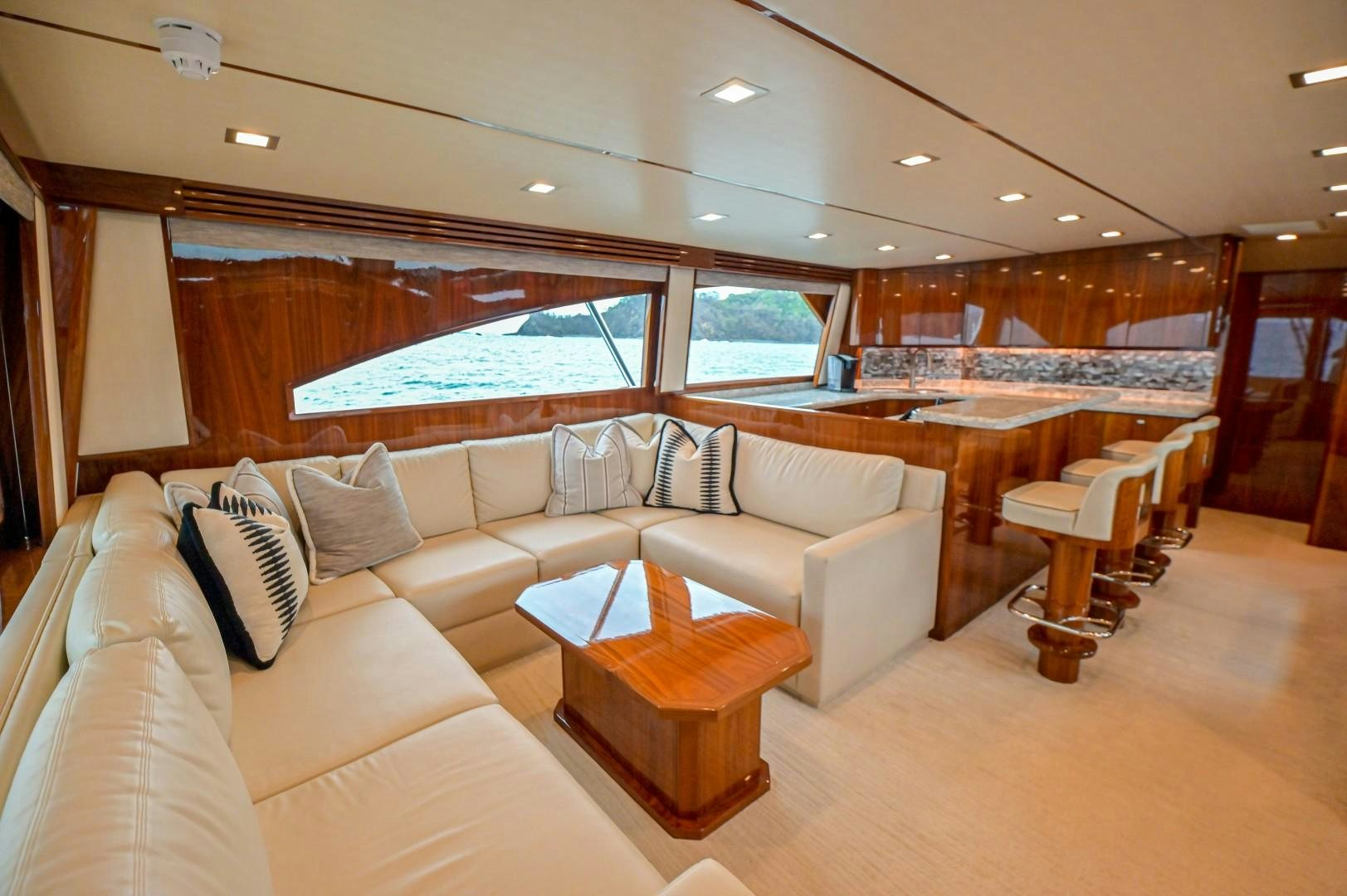 a living room with a large window aboard GOOSE Yacht for Sale