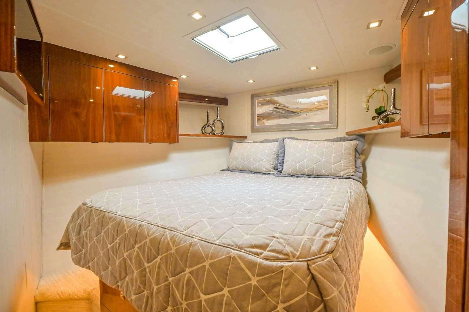 a large bed in a room aboard GOOSE Yacht for Sale