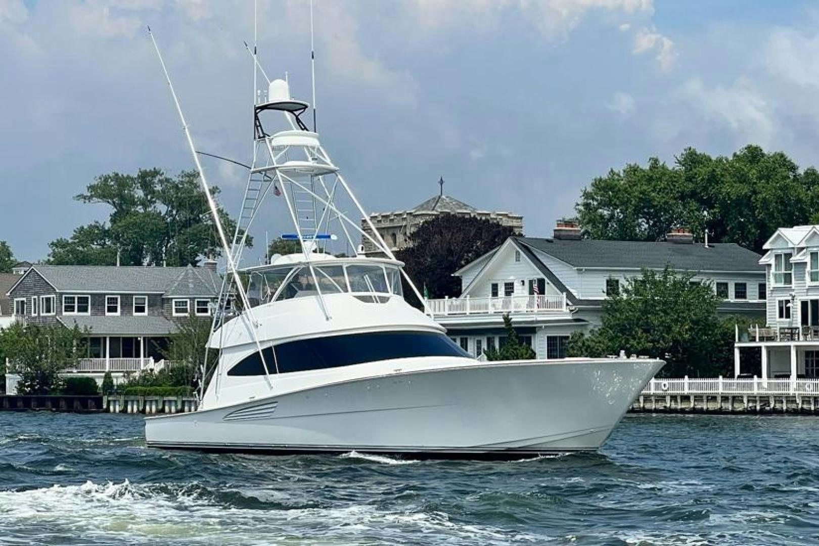 a white boat in the water aboard GOOSE Yacht for Sale