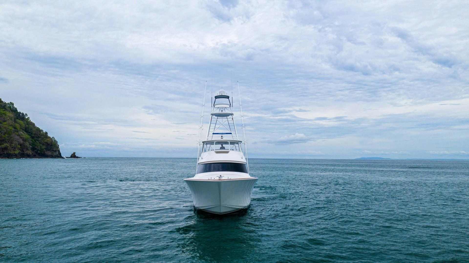 a white boat in the water aboard GOOSE Yacht for Sale