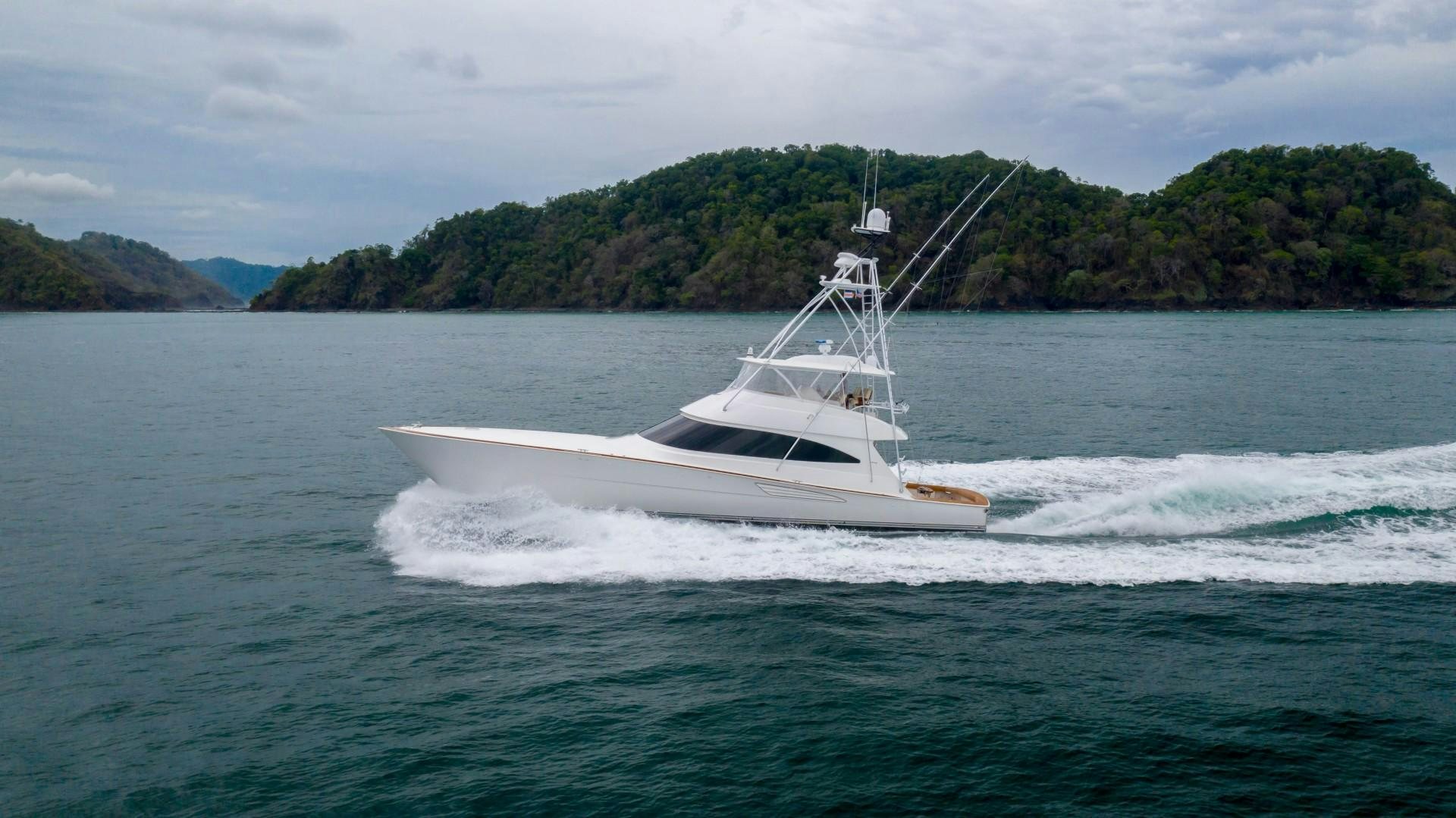 a white boat on the water aboard GOOSE Yacht for Sale