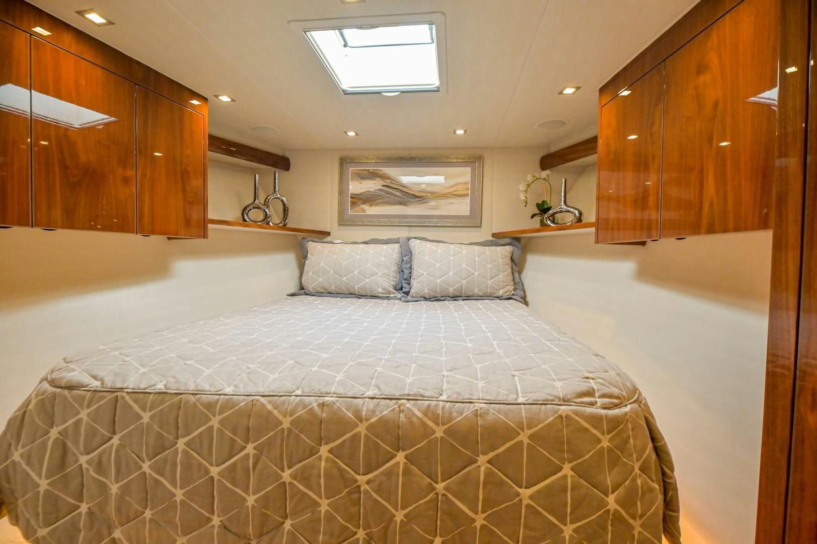 a large bed in a room aboard GOOSE Yacht for Sale