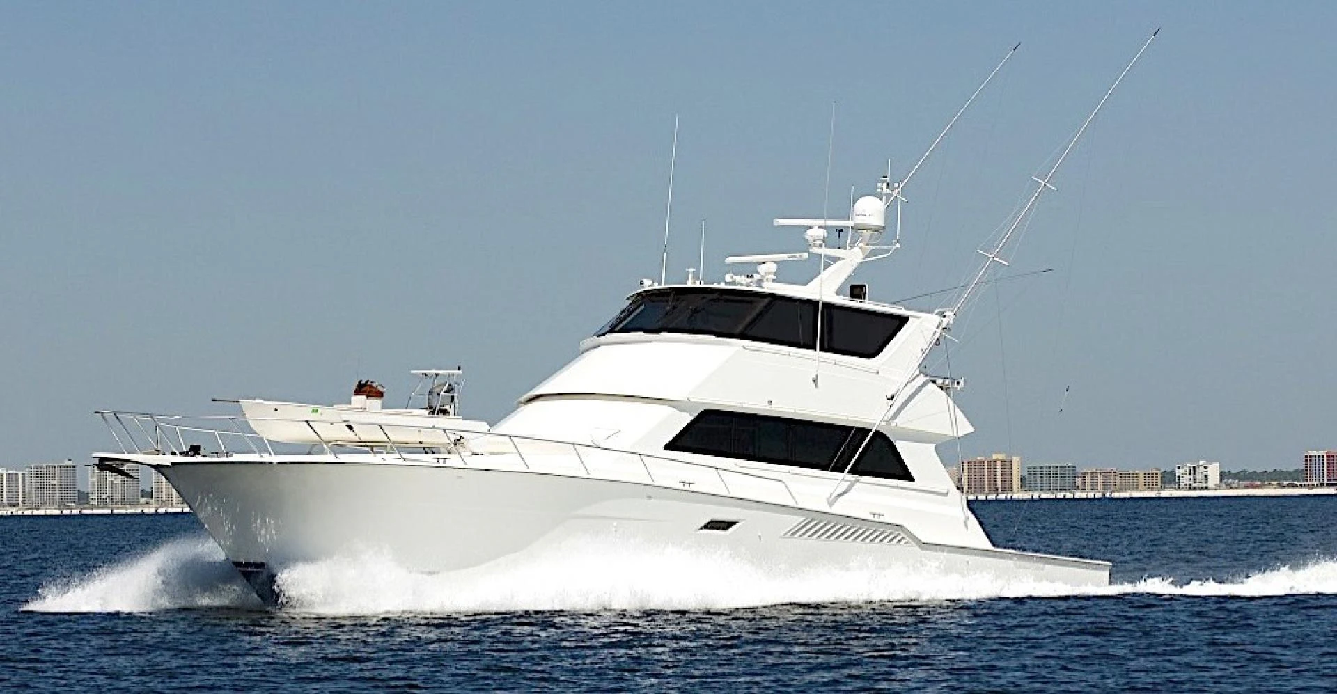 a white yacht on the water aboard CROWN ROYAL Yacht for Sale