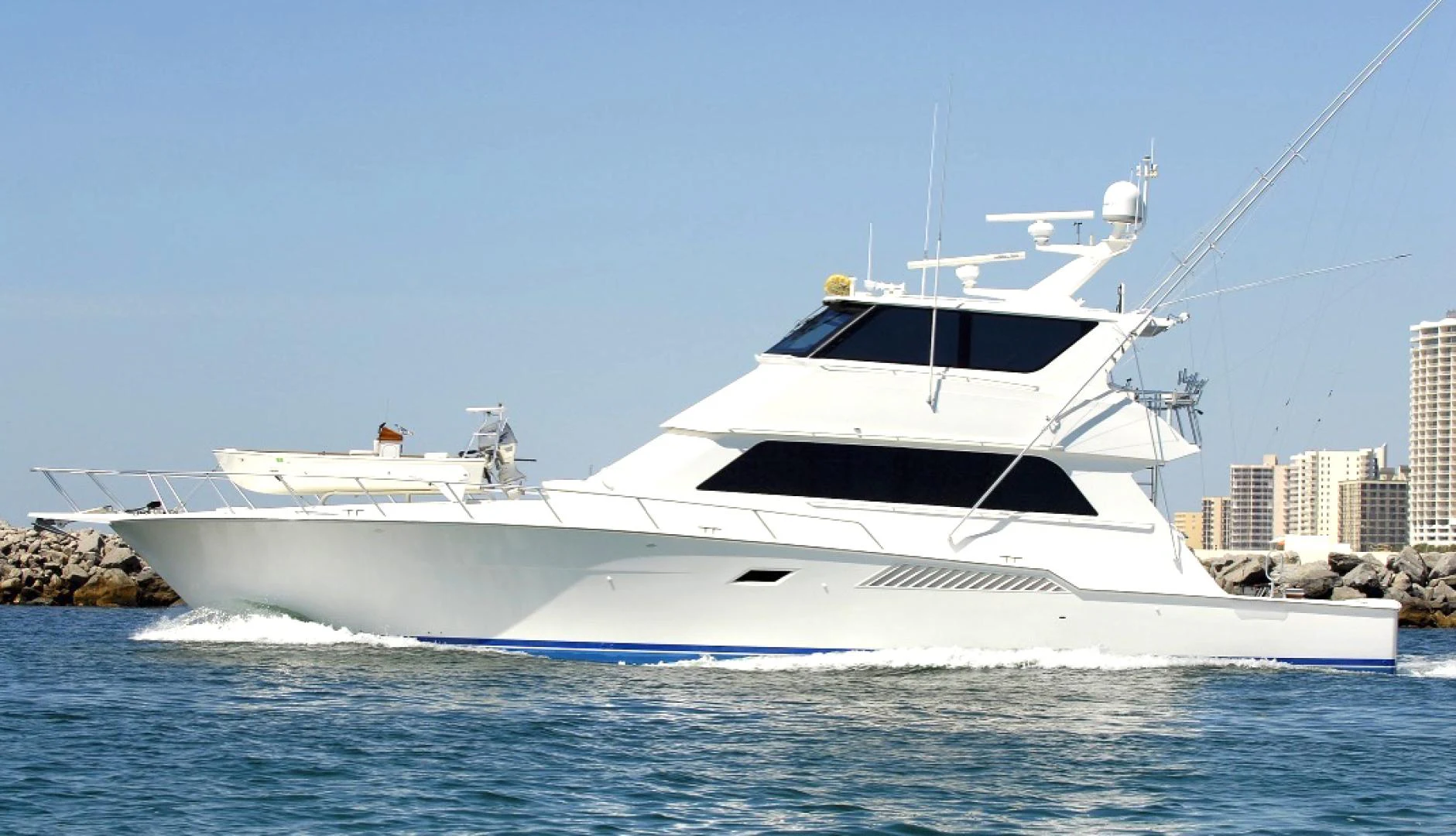 a white yacht on the water aboard CROWN ROYAL Yacht for Sale