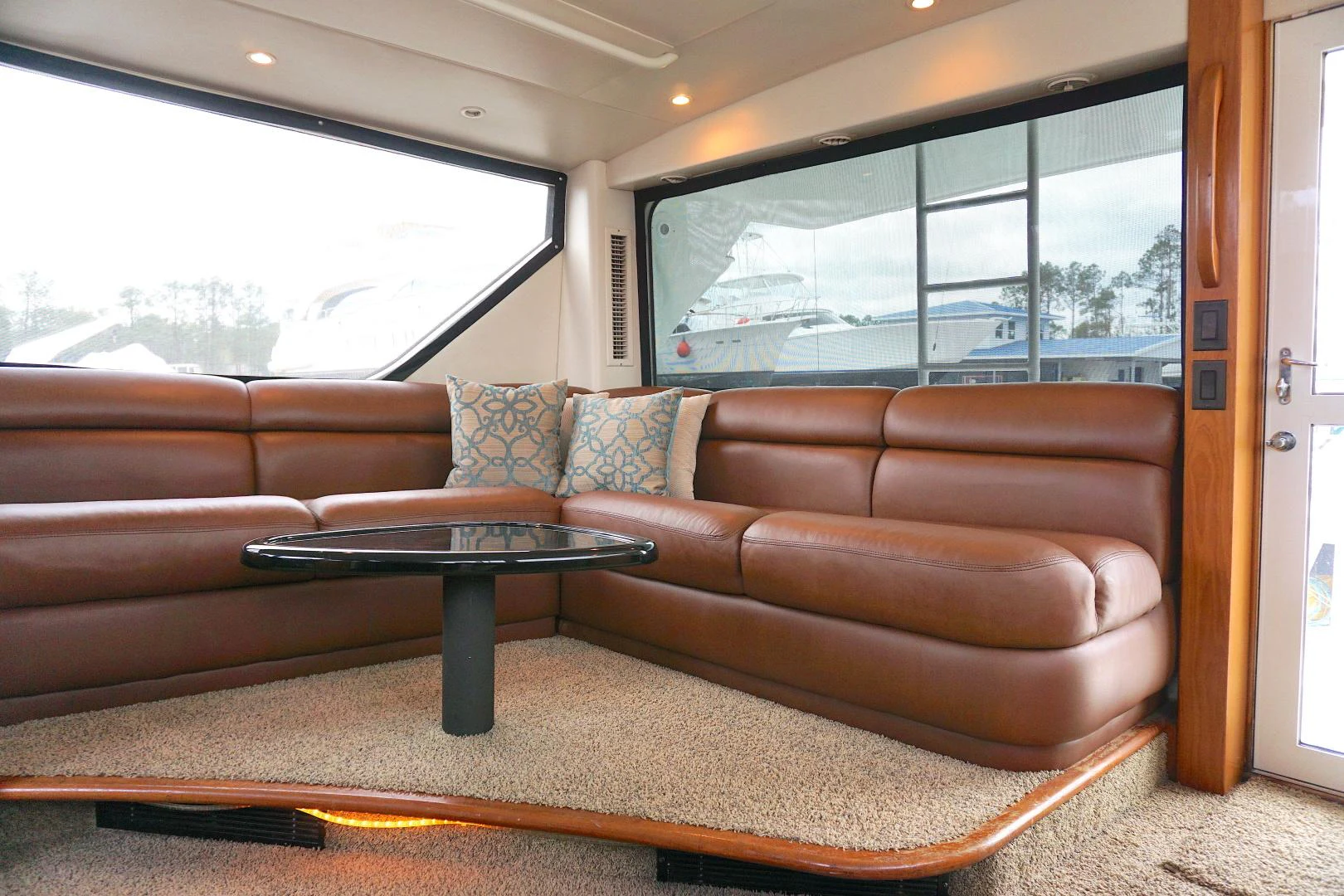 a couch in a room aboard CROWN ROYAL Yacht for Sale