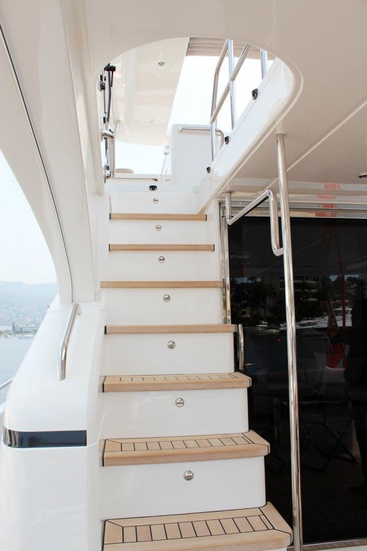 a white tower with a glass door aboard PICHOS III Yacht for Sale