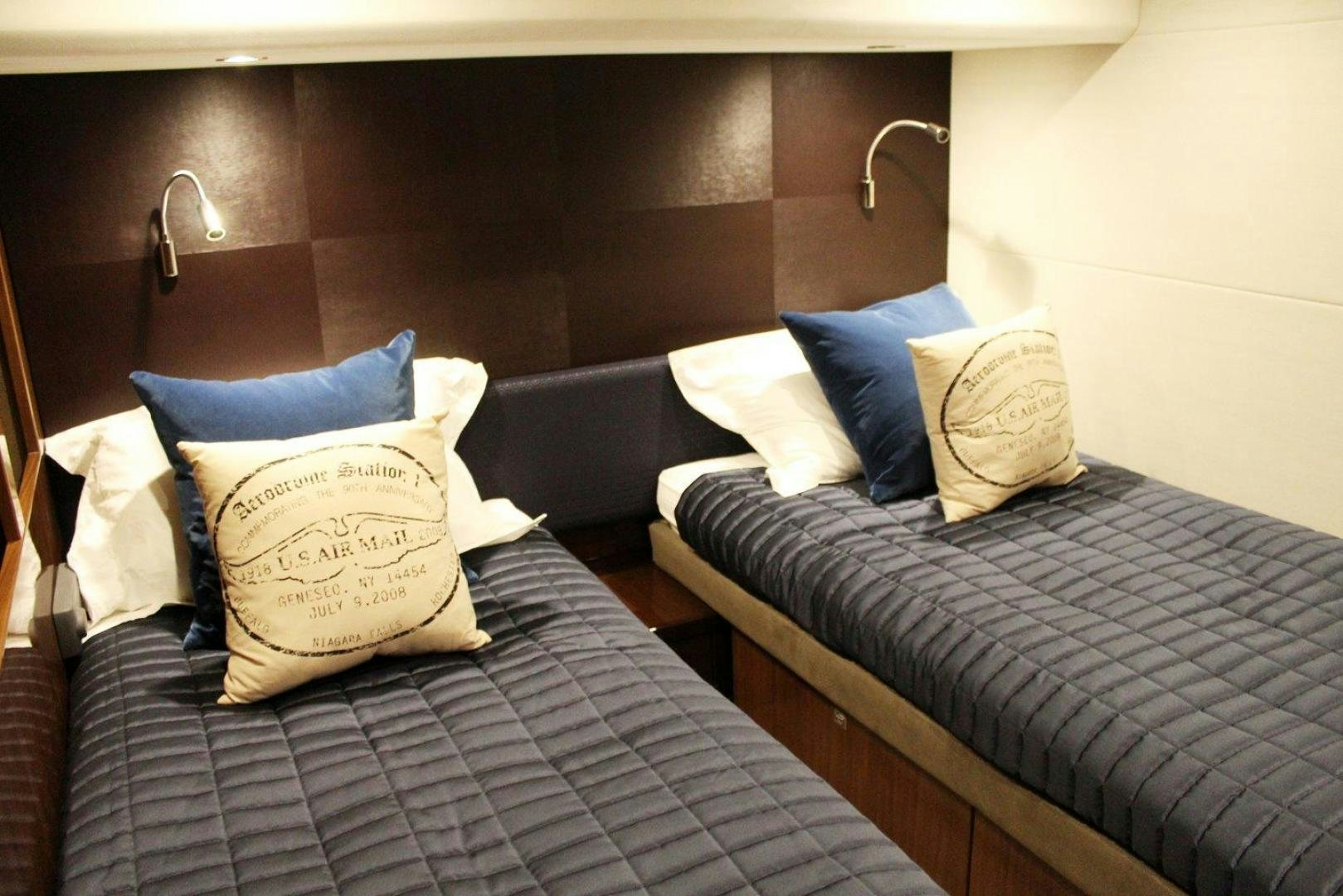 a couple of couches in a room aboard PICHOS III Yacht for Sale