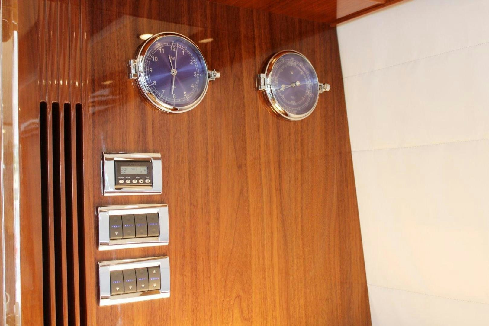 a couple of watches on a table aboard PICHOS III Yacht for Sale