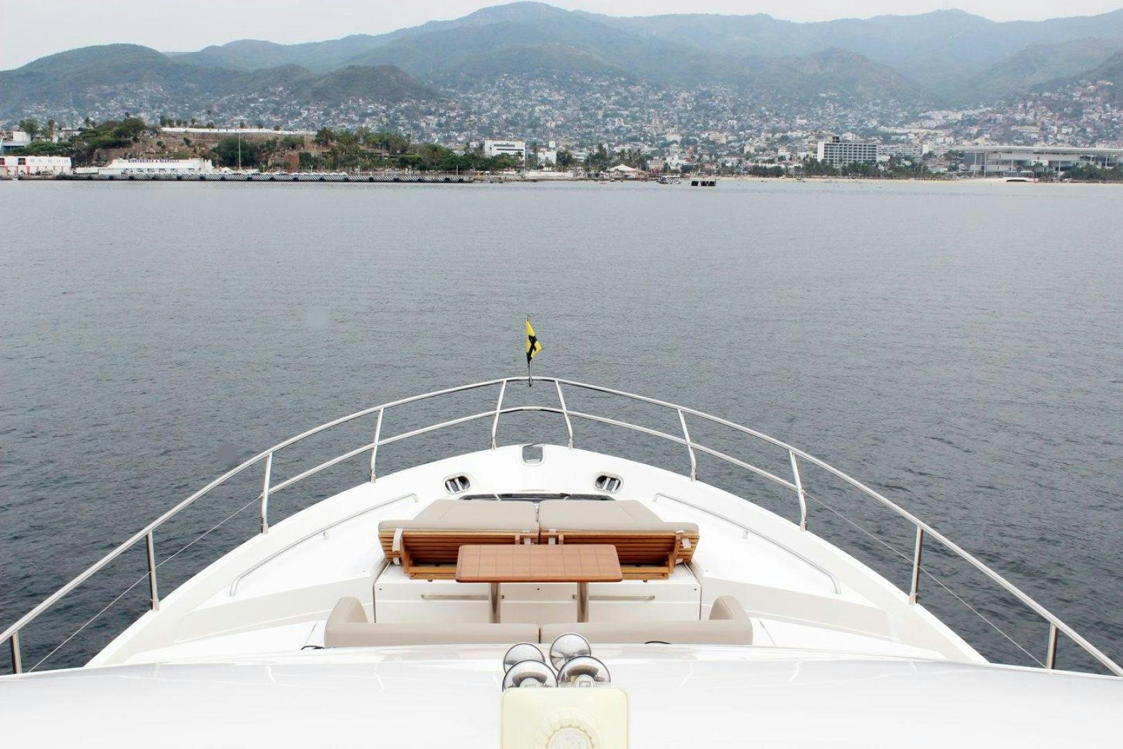 a large white bridge over a body of water aboard PICHOS III Yacht for Sale