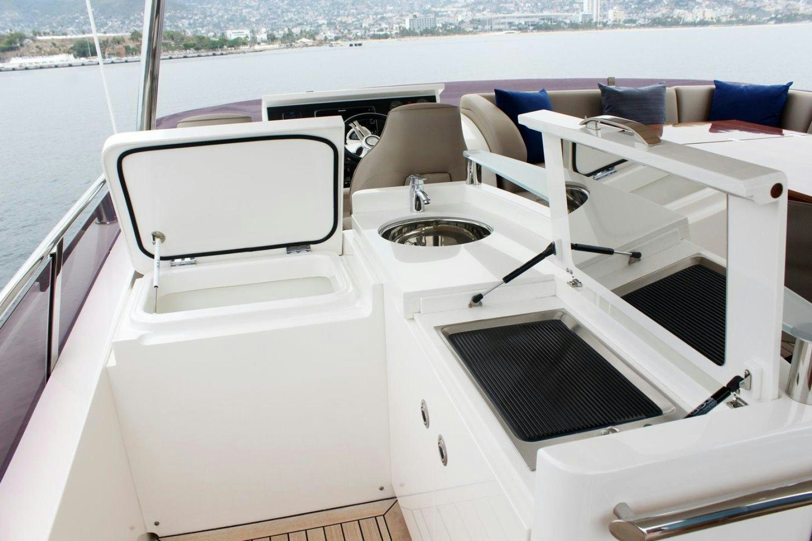 a boat with a sink and chairs aboard PICHOS III Yacht for Sale