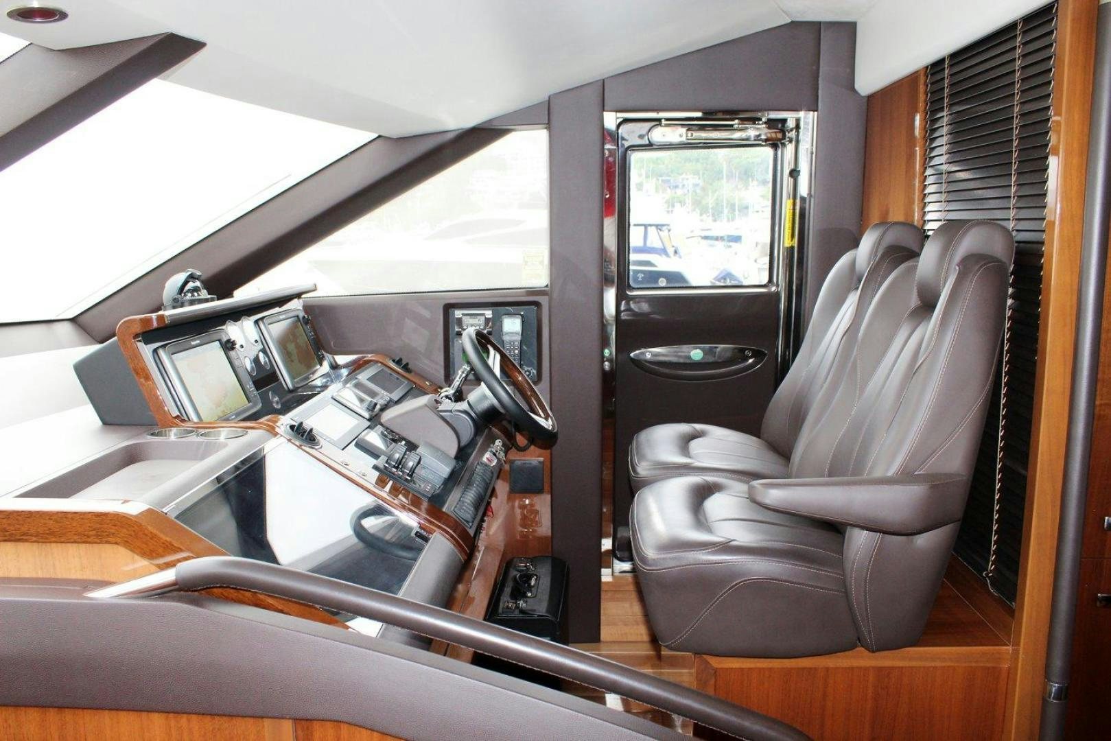 a vehicle with a seat and a seat aboard PICHOS III Yacht for Sale