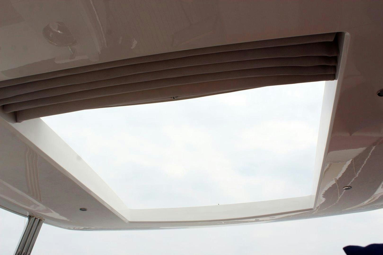a window with a white frame aboard PICHOS III Yacht for Sale