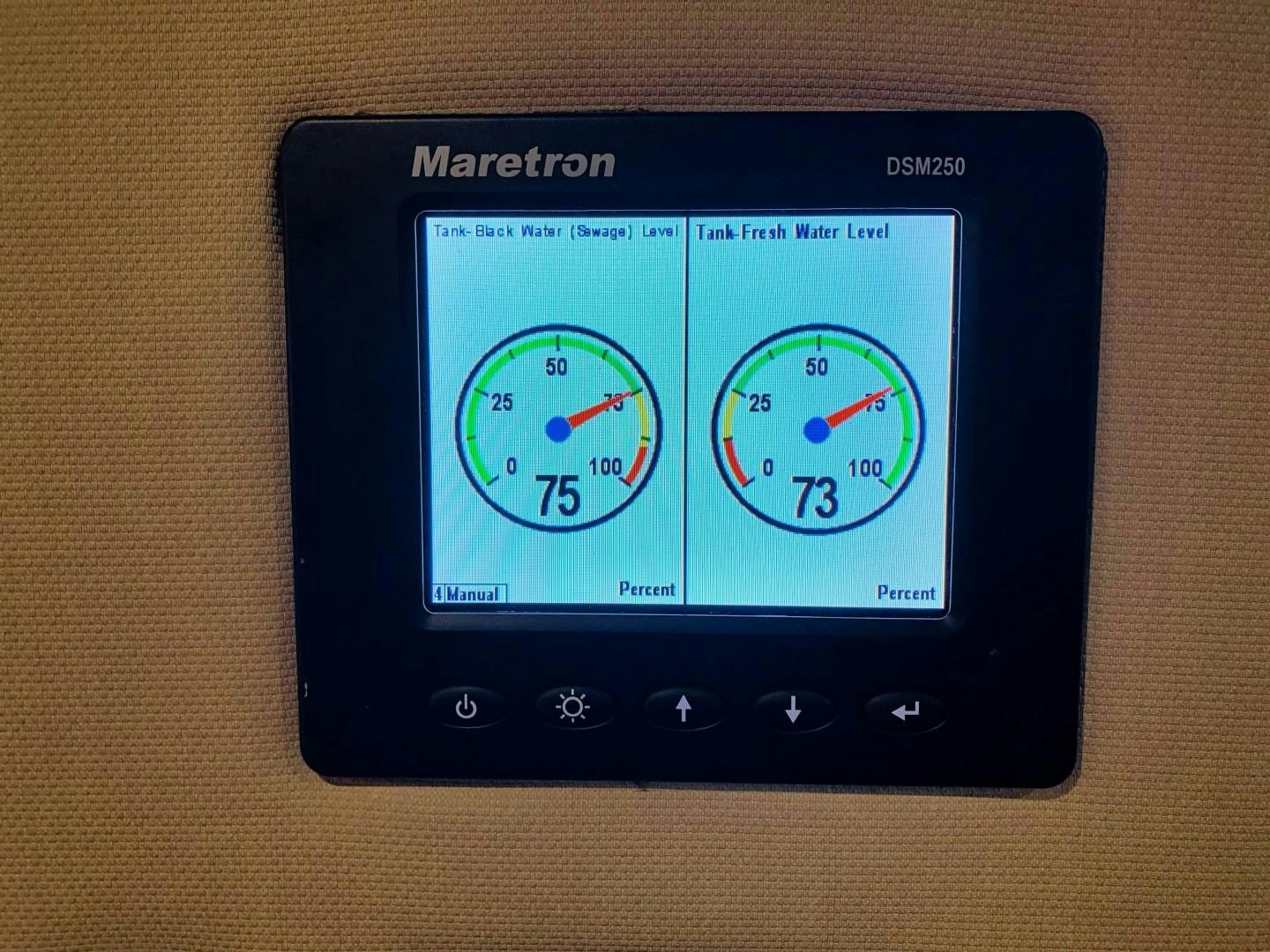 a black rectangular device with a screen aboard SIMPLICITY Yacht for Sale