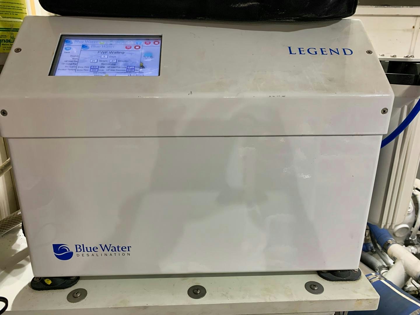 a white machine with a screen aboard SIMPLICITY Yacht for Sale