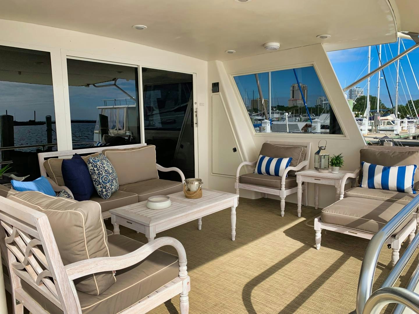 a living room with a large window aboard SIMPLICITY Yacht for Sale