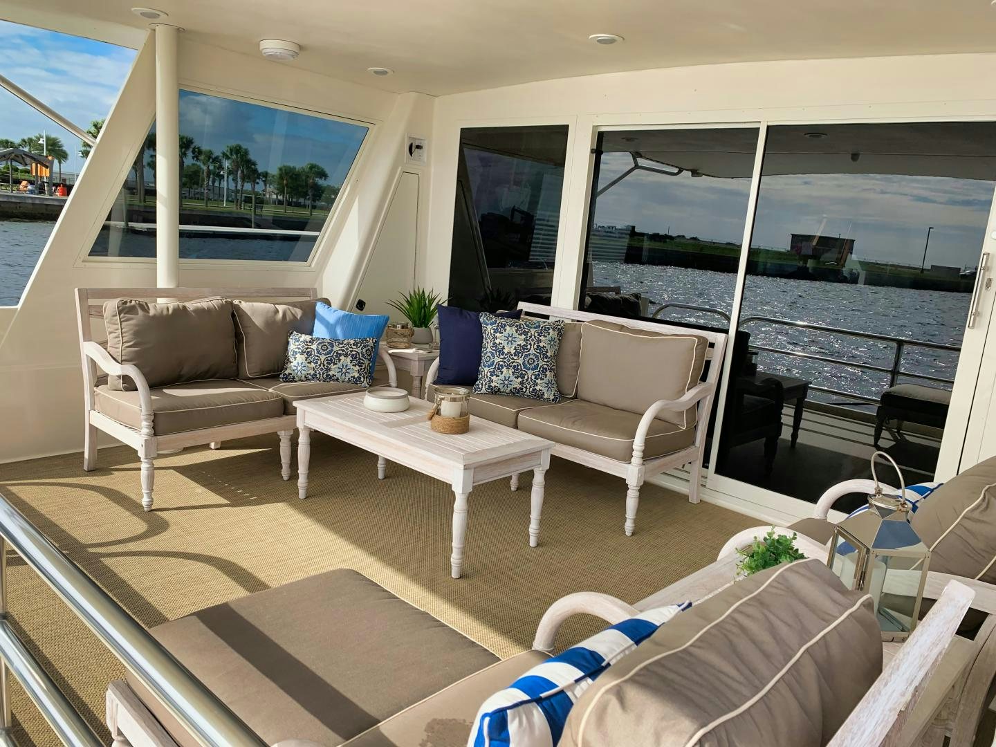 a living room with a large window aboard SIMPLICITY Yacht for Sale