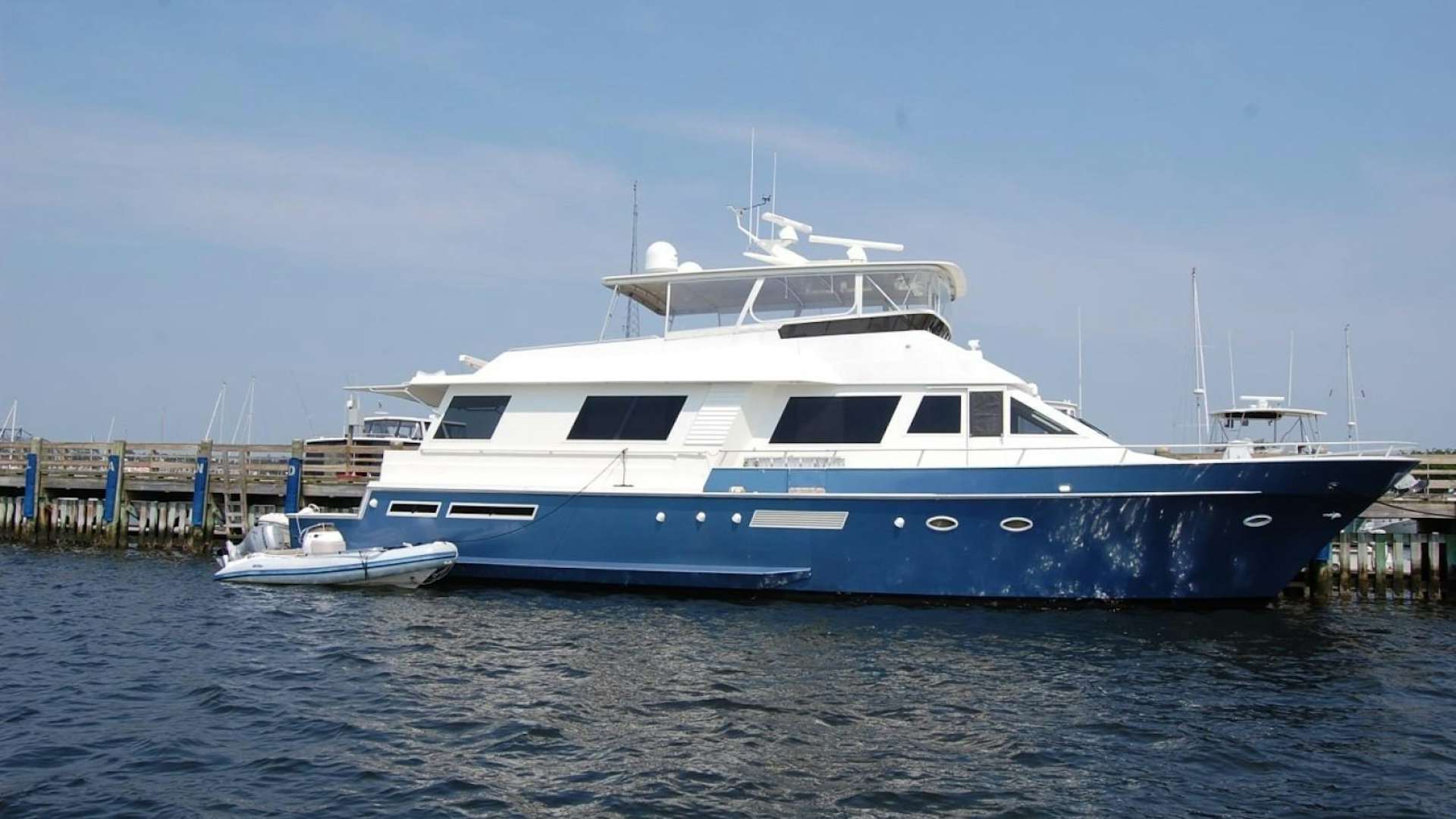 a couple of boats in the water aboard SIMPLICITY Yacht for Sale