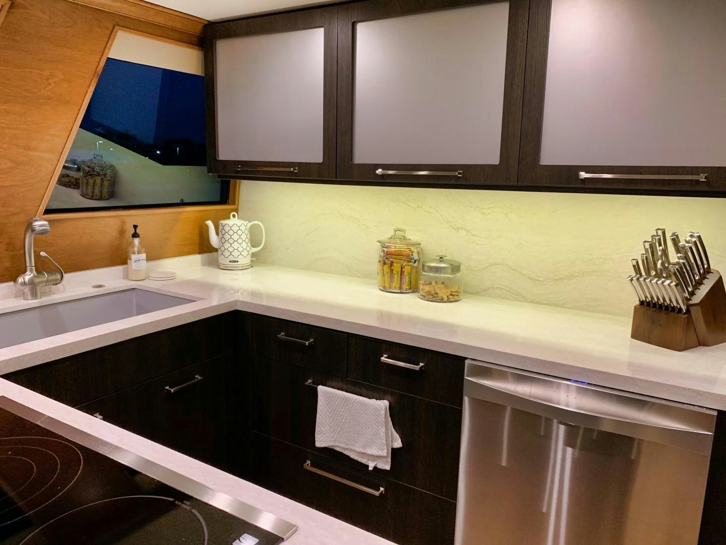 a kitchen with a mirror aboard SIMPLICITY Yacht for Sale