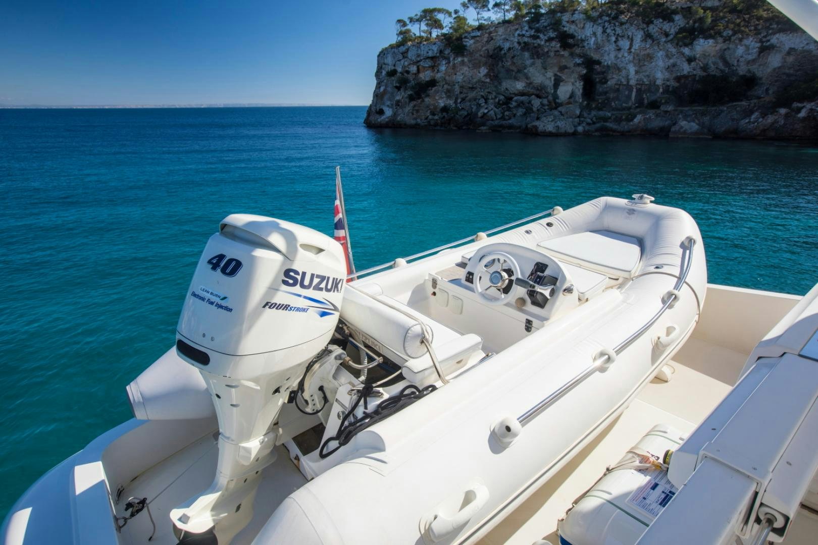 a boat on the water aboard MYTHOS Yacht for Sale
