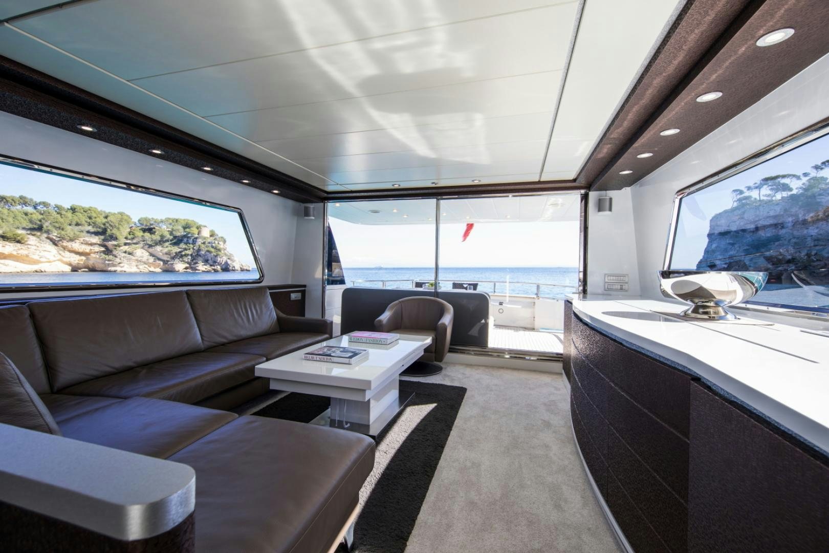 inside of a car aboard MYTHOS Yacht for Sale