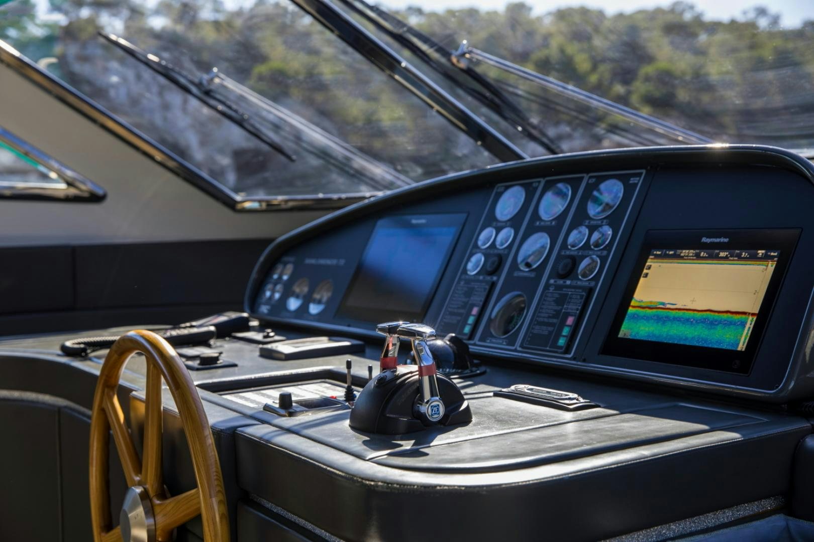 inside of a car aboard MYTHOS Yacht for Sale
