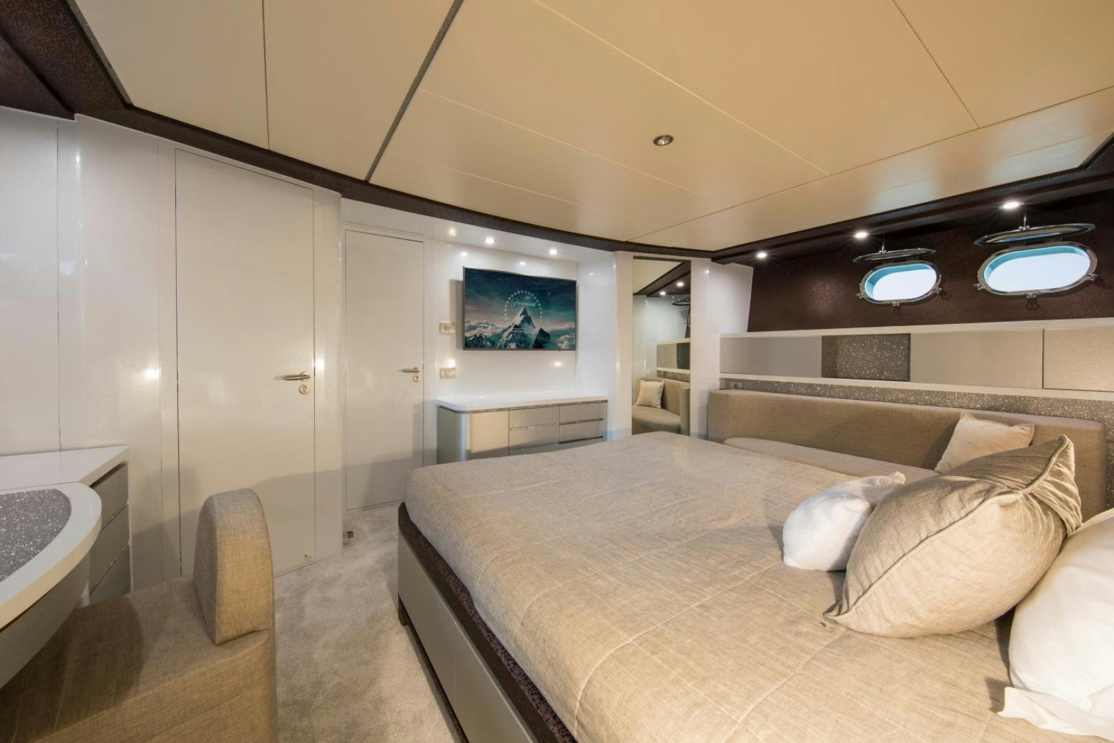 a bed in a room aboard MYTHOS Yacht for Sale