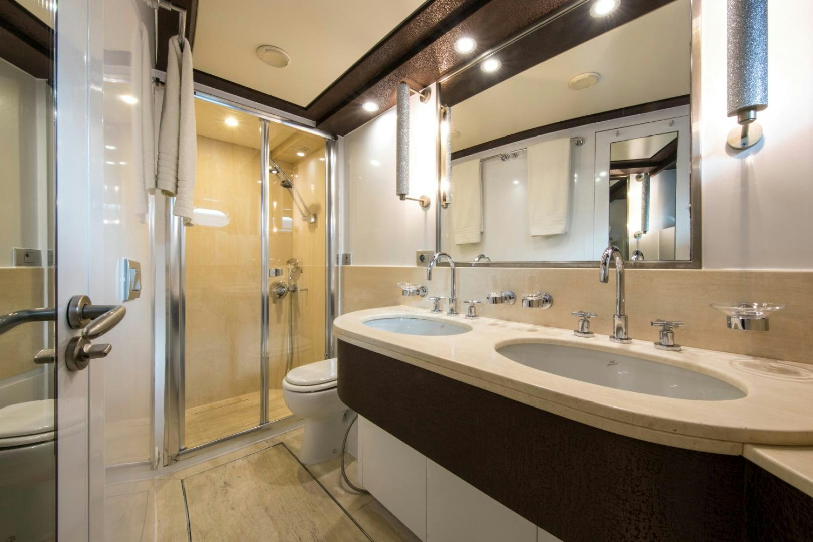 a bathroom with sinks and mirrors aboard MYTHOS Yacht for Sale