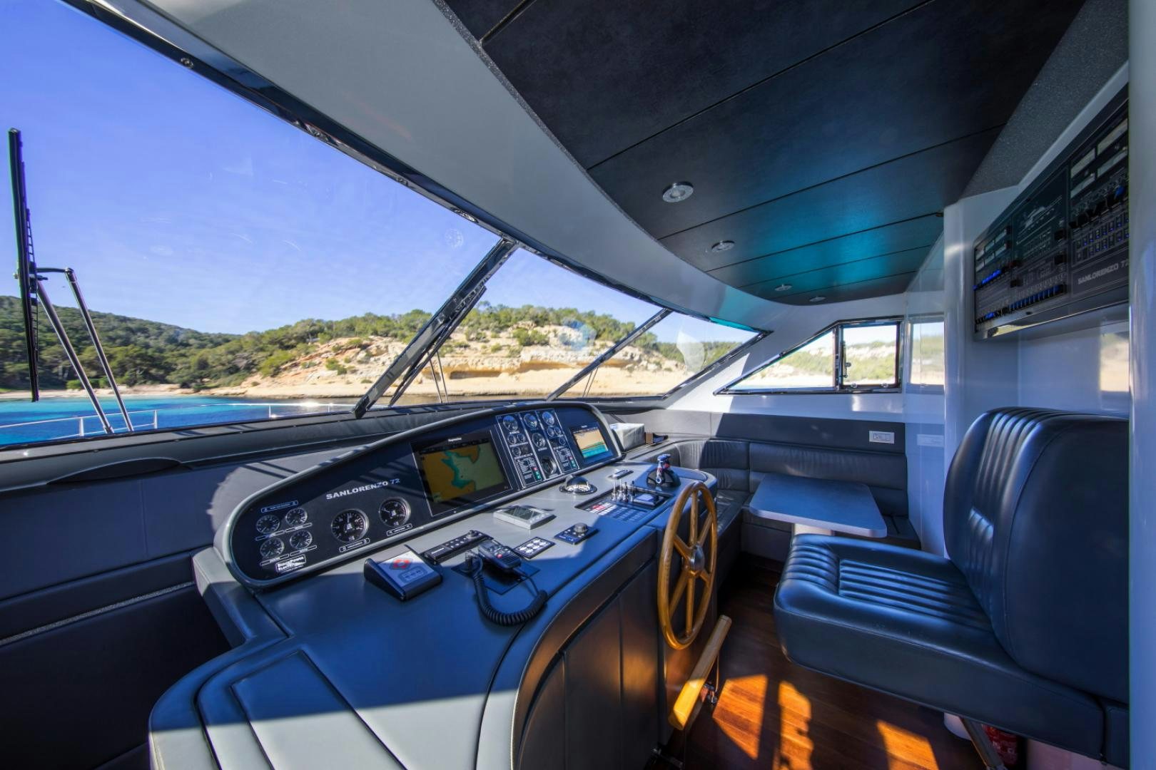 inside of a car aboard MYTHOS Yacht for Sale