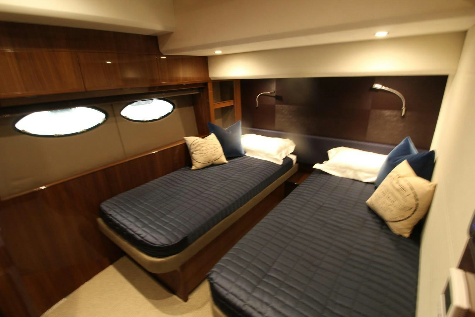 a bed in a room aboard PISCHOS III Yacht for Sale