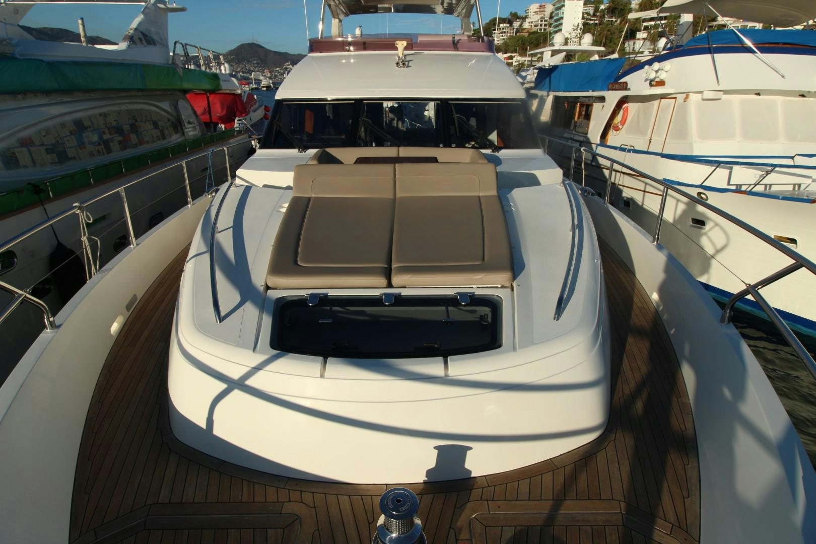 a boat is parked in a harbor aboard PISCHOS III Yacht for Sale