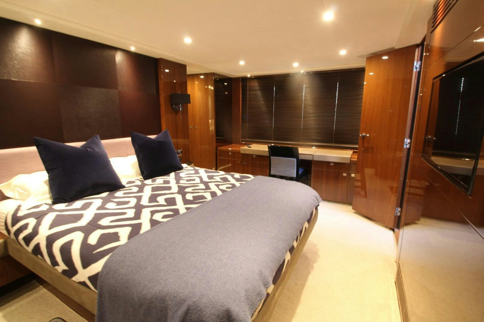 a bed in a hotel room aboard PISCHOS III Yacht for Sale