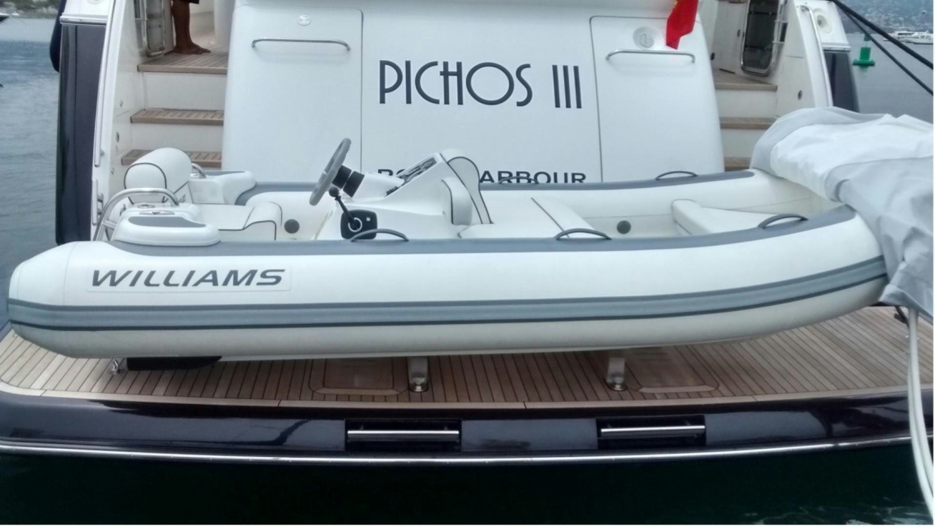 a white car with a hood aboard PISCHOS III Yacht for Sale